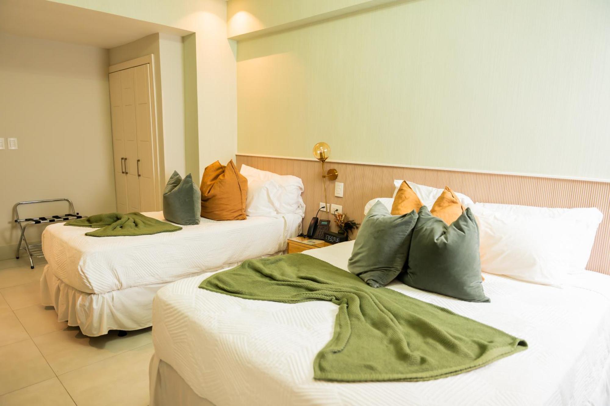 Hotel Stay Here Suites Santo Domingo Exterior foto